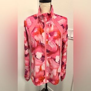 New without tag Athletic “run with it jacket” in printed coral color size M